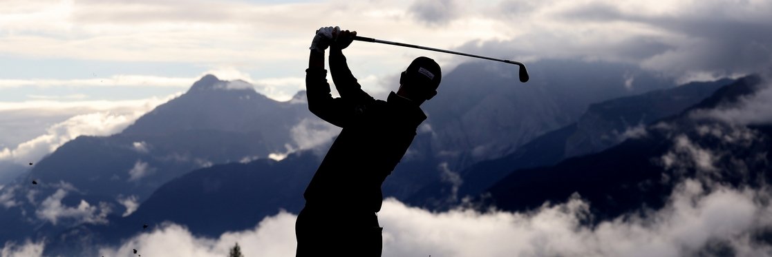 CRANS-MONTANA, SWITZERLAND - SEPTEMBER 05: Gary Hurley of Ireland plays his second shot on the 14th hole on Day One of the Omega European Masters 2024 at Crans-sur-Sierre Golf Club on September 05, 2024 in Crans-Montana, Switzerland. (Photo by Warren Little/Getty Images)