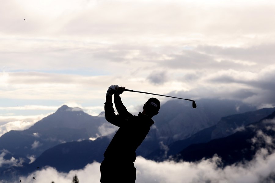 CRANS-MONTANA, SWITZERLAND - SEPTEMBER 05: Gary Hurley of Ireland plays his second shot on the 14th hole on Day One of the Omega European Masters 2024 at Crans-sur-Sierre Golf Club on September 05, 2024 in Crans-Montana, Switzerland. (Photo by Warren Little/Getty Images)