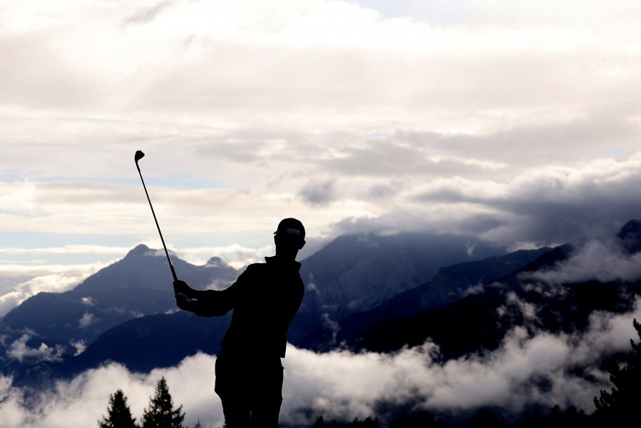 CRANS-MONTANA, SWITZERLAND - SEPTEMBER 05: Gary Hurley of Ireland plays his second shot on the 14th hole on Day One of the Omega European Masters 2024 at Crans-sur-Sierre Golf Club on September 05, 2024 in Crans-Montana, Switzerland. (Photo by Warren Little/Getty Images)